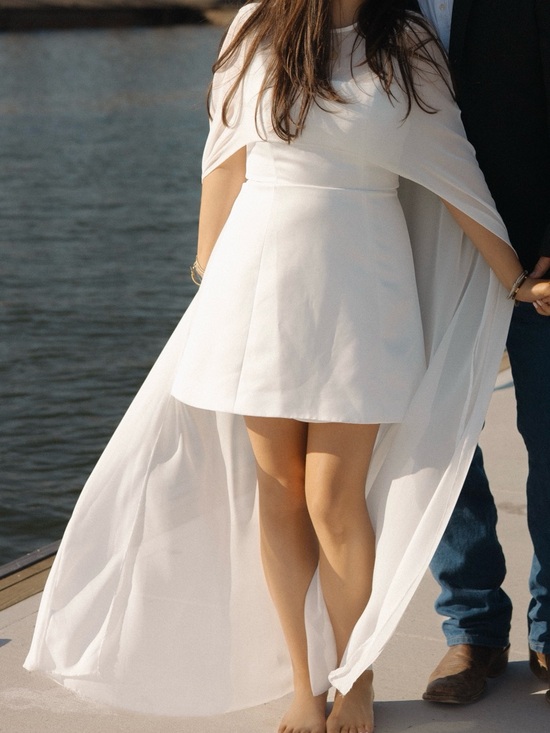 Elliatt Dresses & Skirts - Elliatt White Mini Dress with Cape Overlay